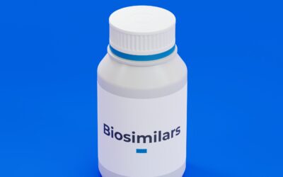Biosimilars pharmaceutical drug bottle on blue background.